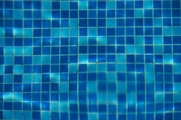 Blue swimming pool tile background