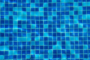 Blue swimming pool tile background