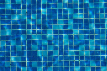 Blue swimming pool tile background