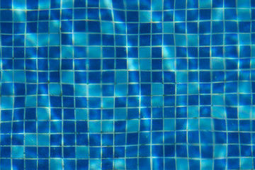 Blue swimming pool tile background