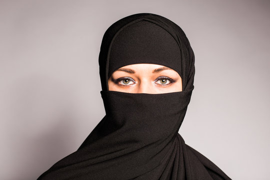 Beautiful Muslim girl wearing burqa closeup