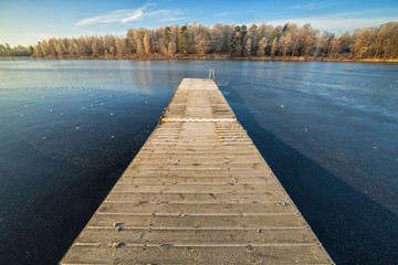 Wooden bridge in cold November scenery