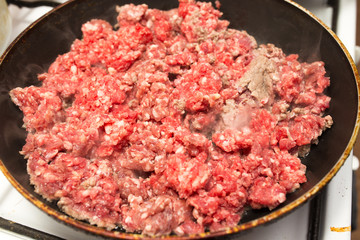 beef fried in a pan