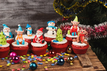 Christmas cupcakes with colored decorations