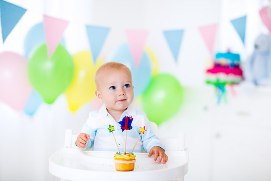 Little baby boy celebrating first birthday