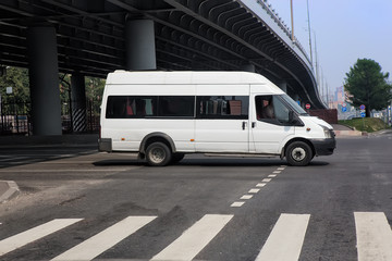 minibus goes on the city street