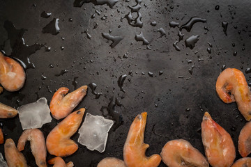 Close fresh raw shrimps on display ice