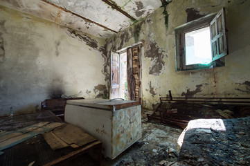 old room destroyed with fridge fall down