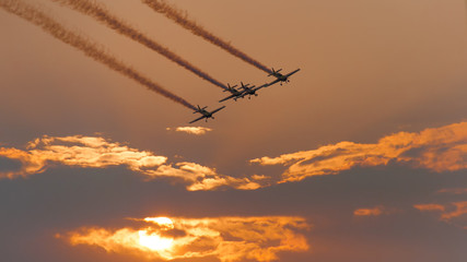 4 planes formation in an airshow demonstration
