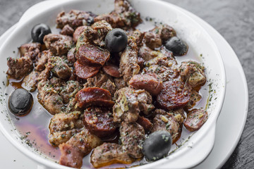 pica pau portuguese spicy sauce pork and sausage tapas snack