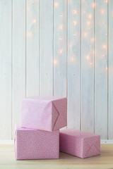 Pink gift box with ribbon bow isolated on white background