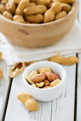 peanuts on wooden surface
