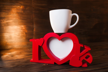 red photoframe with a cup