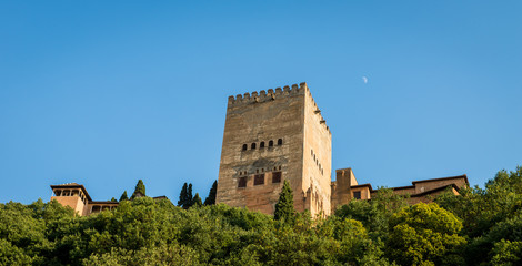 Fototapeta na wymiar Granada - The Alhambra palace and fortness complex in evening light.