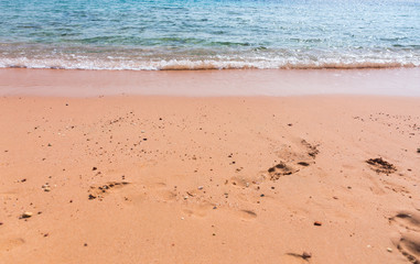 Fototapeta na wymiar Footprints in the sand