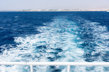 View of ship's wake from boat