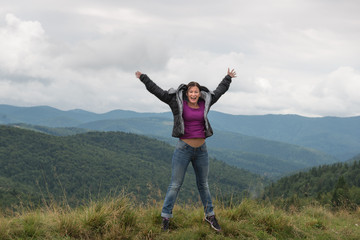 Fototapeta premium Woman in mountains Carpathians. Ukraine. 