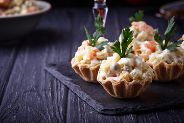 Tartlets with Russian salad, festive appetizer