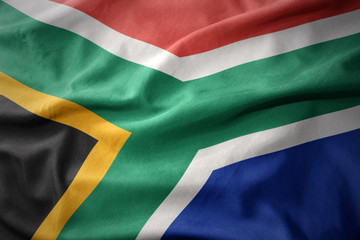 waving colorful flag of south africa. © luzitanija