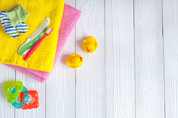 baby accessories for bath on wooden background