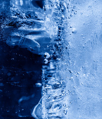 Micro air bubbles in the ice frozen during their movement to the water surface. 1 : 1 macro lens...