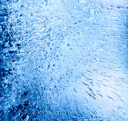 Micro air bubbles in the ice frozen during their movement to the water surface. 1 : 1 macro lens shot