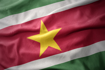 waving colorful flag of suriname.