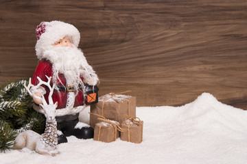 Obraz na płótnie Canvas santa claus and snowy background