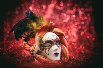 Carnival mask on red blur background