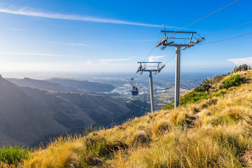 Top of the mountain and a cableway at sunset