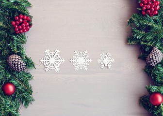 Naklejka na ściany i meble Vintage christmas flat lay with objects over gray wood background