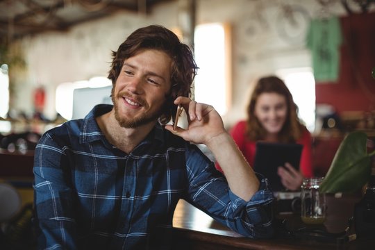 Handsome Man Talking On Mobile Phone 