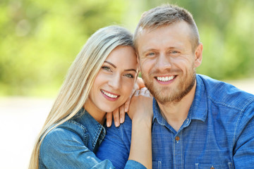 Portrait of happy couple in the park
