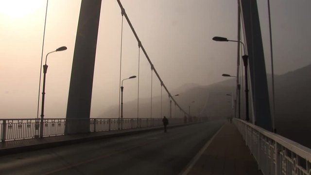 Bridge in the fog mist in China