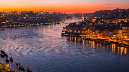 Night view of the Douro river and Ribeiro in Porto, Portugal.