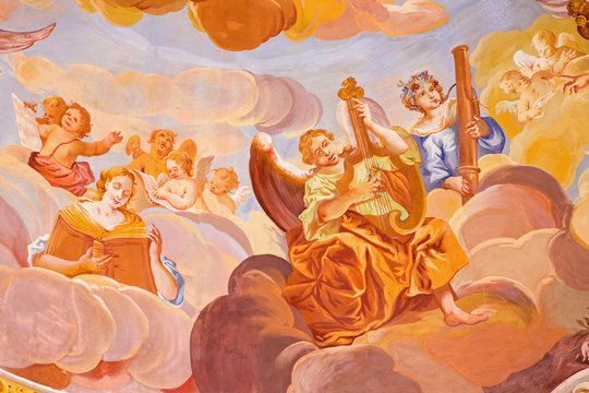 BANSKA STIAVNICA, SLOVAKIA - FEBRUARY 20, 2015: The detail of fresco on cupola in the middle church of baroque calvary by Anton Schmidt from years 1745. Angels with the music instruments.