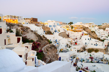 An evening scene of Oia village in Santorini