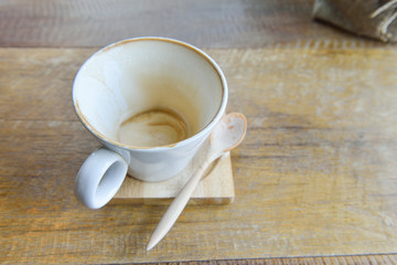 empty latte coffee  cup mug on wooden table