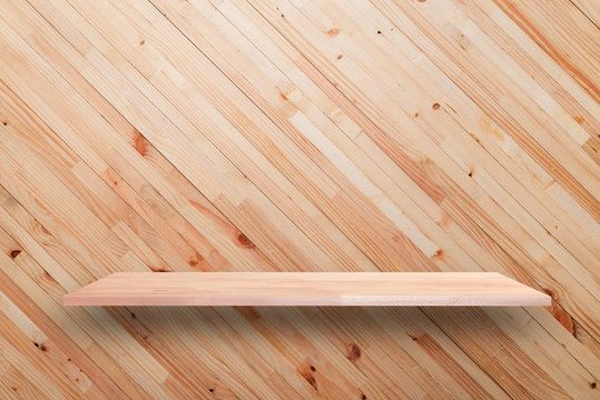 Wooden shelf on bround wood wall background  - can be used for d