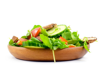 Fresh arugula salad on plate