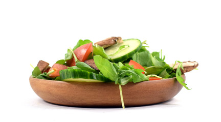 Fresh arugula salad on plate