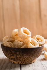 Pork rinds also known as chicharon or chicharrones, deep fried p
