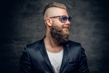Smiling bearded male in sunglasses