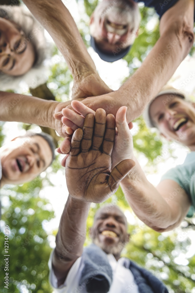 Wall mural Group Of Senior Retirement Exercising Togetherness Concept