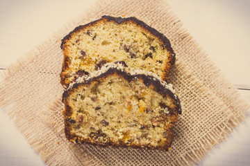 Vintage photo, Fresh baked fruitcake on white boards