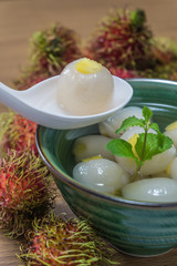 Peeled rambutan stuffed with pineapple in syrup.