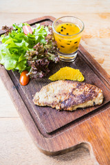 Foie gras steak with vegetable and sweet sauce