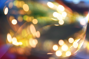 Festive winter gold abstract. background with bokeh lights and s