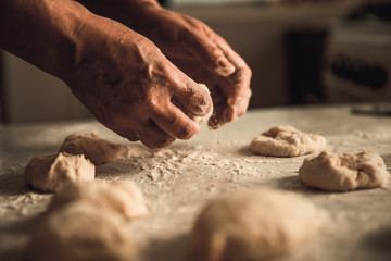 homemade cakes of the dough in the women's hands