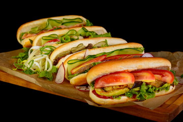 hot dog with eggplant on a black background